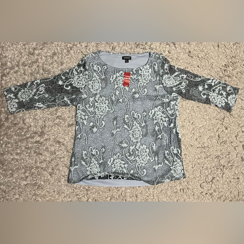 Womans light blue lacy blouse NWT